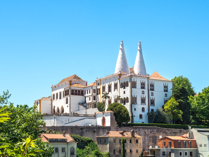 View of Sintra National Palace exterior with white cones.