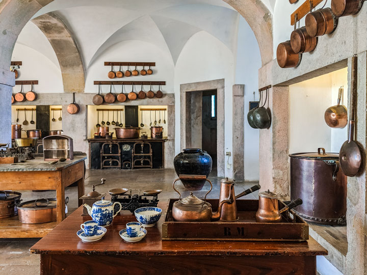 Old kitchen table and cookery in Pena Palace, a must see during a day in Sintra.