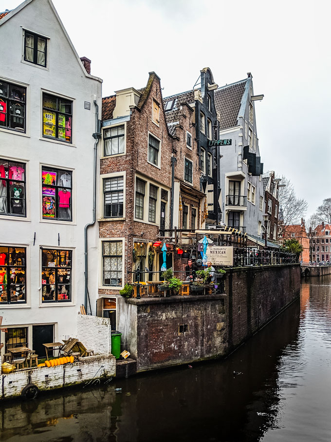 Amsterdam De Wallen canal houses.