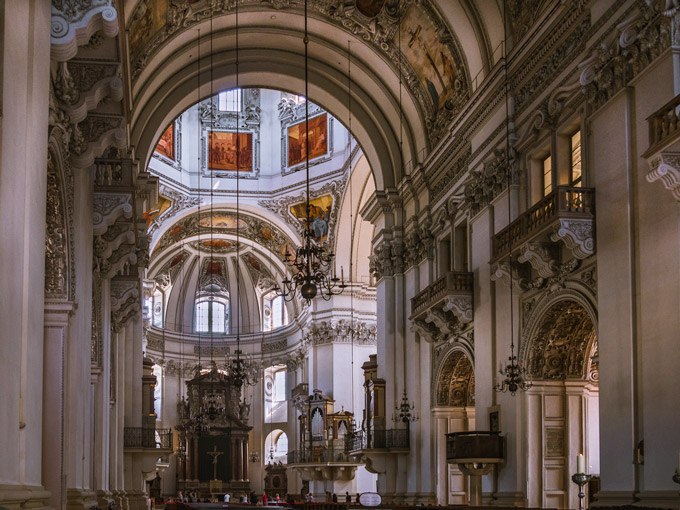 Interior of Salzburg Cathedral with ornate carvings, a must see for a Salzburg itinerary.