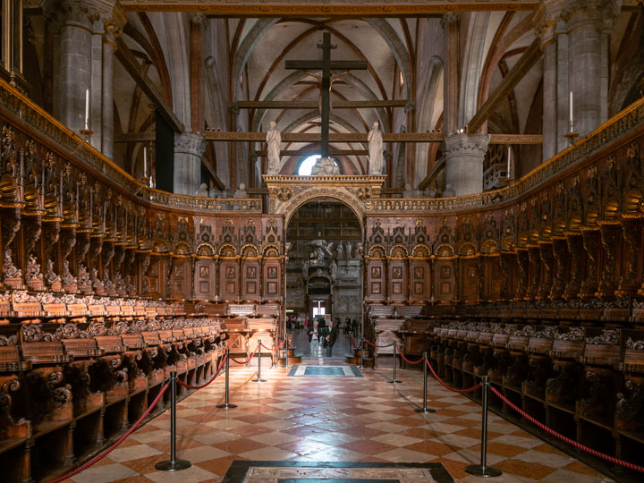 Venice Basilica dei Frari interior with carved wooden Choir and checkered floor