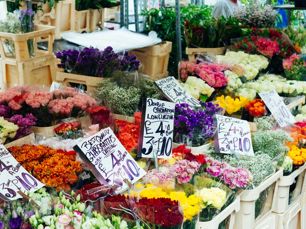 Displays of flower bouquets at Columbia Road Flower Market.