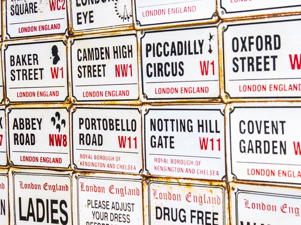 Rows of London street sign on display for sale.