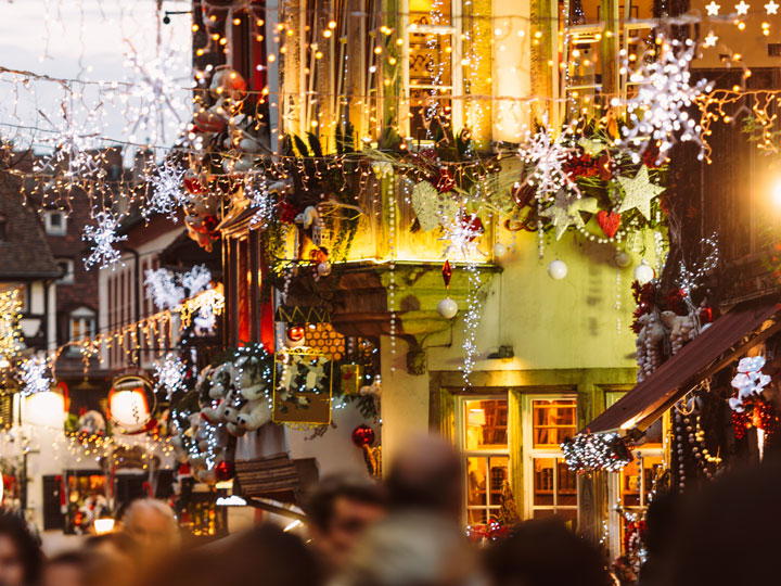 Strasbourg street decorated with Christmas lights, one of the best winter city breaks in Europe