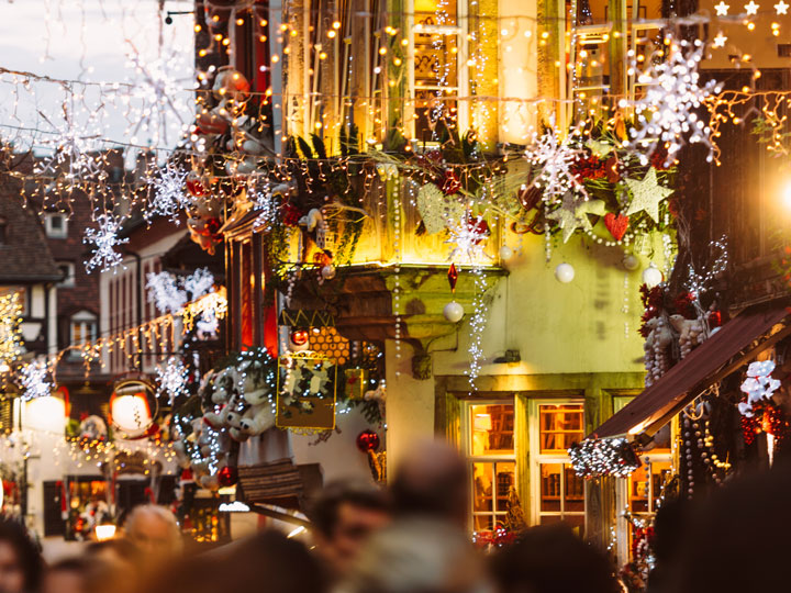 Strasbourg street decorated with Christmas lights, one of the best winter city breaks in Europe.