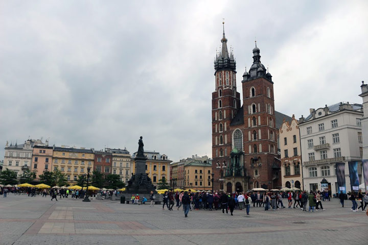 Cloudy day view of Krakow town square.