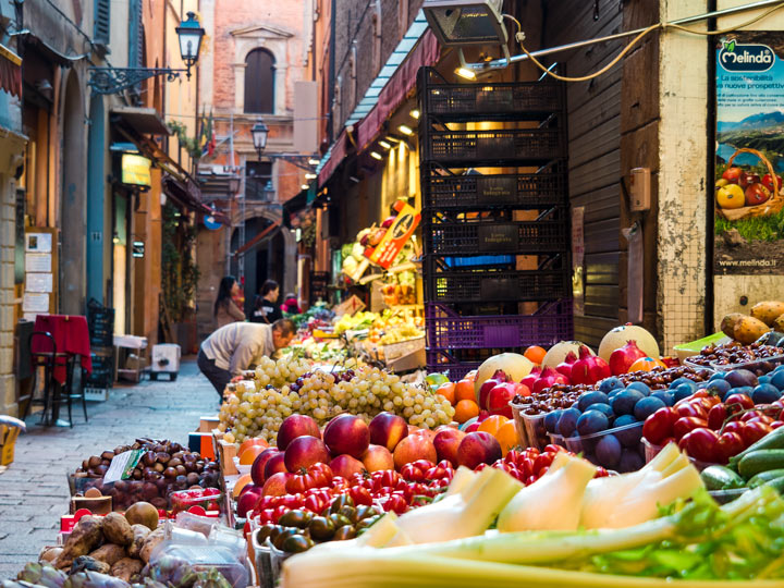 Fresh produce stand at the Quadrilatero, one of the most popular Bologna sightseeing attractions.