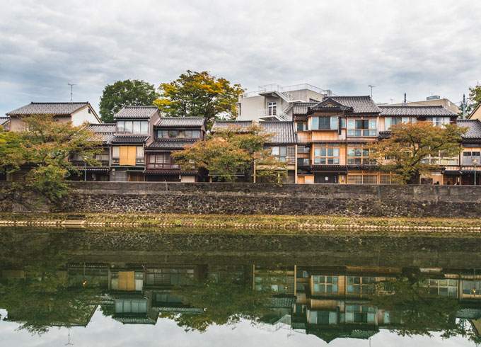 View of Kazuemachi houses next to river in Kanazawa Japan.