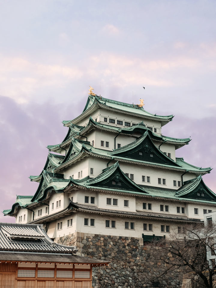 Nagoya Castle with purple sunset sky, among the best bullet train trip from Tokyo.