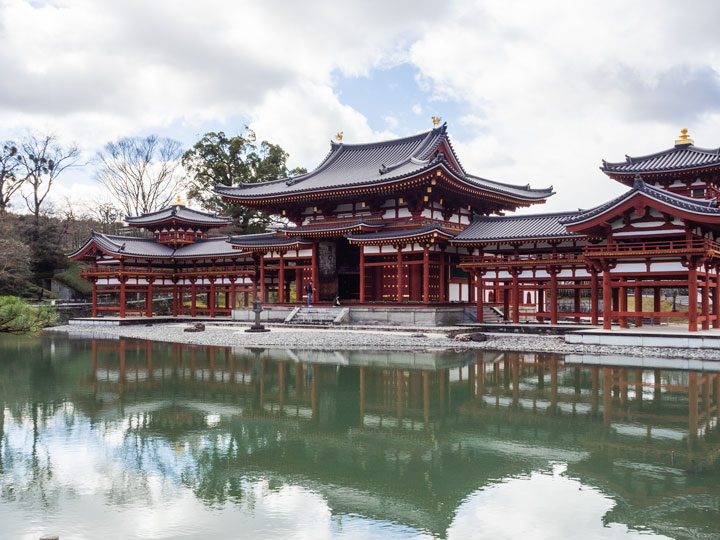 Uji Byodo-in temple with reflection in pond.