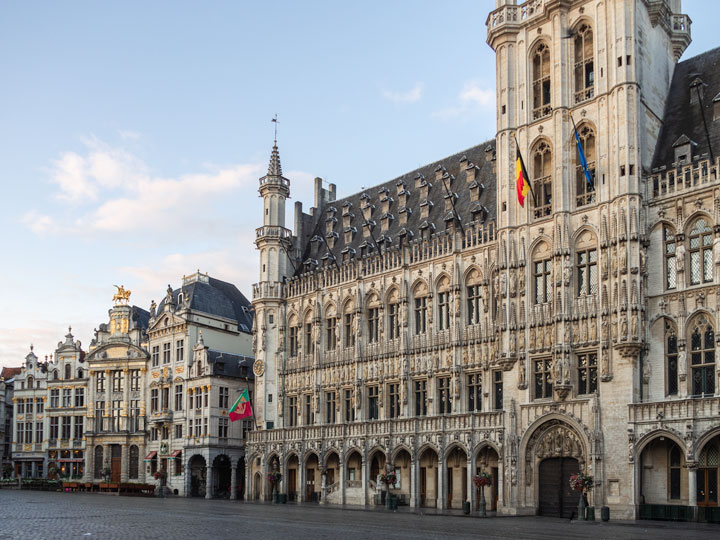 Brussels Grand Place medieval town hall building at sunrise.