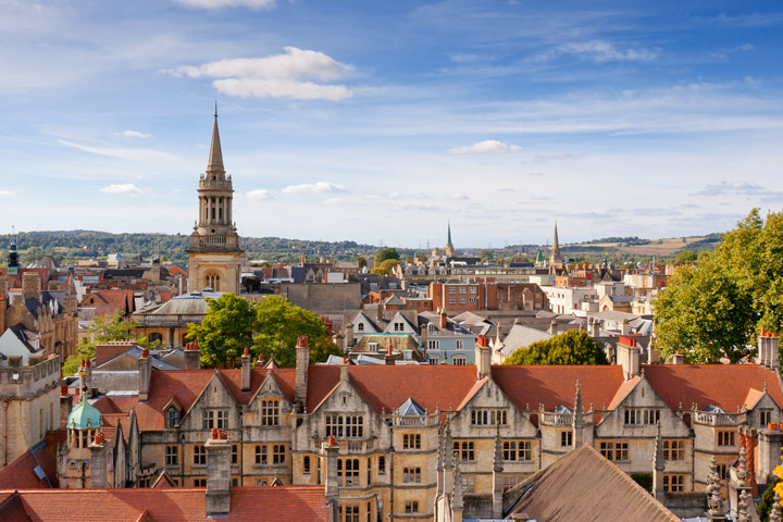 Birds-eye view of Oxford city skyline on sunny day.