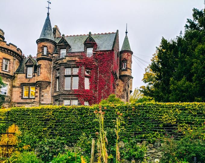 Edinburgh Zoo with building covered in red ivy.