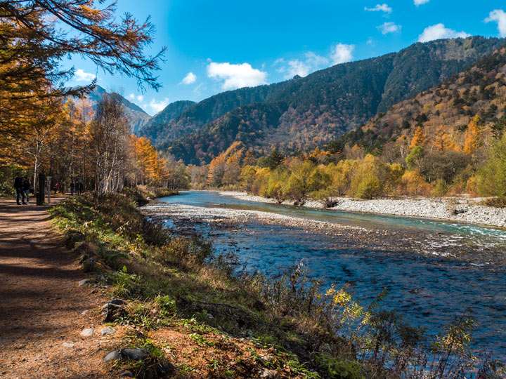 Kamikochi National Park Japan during autumn with river and mountain view.