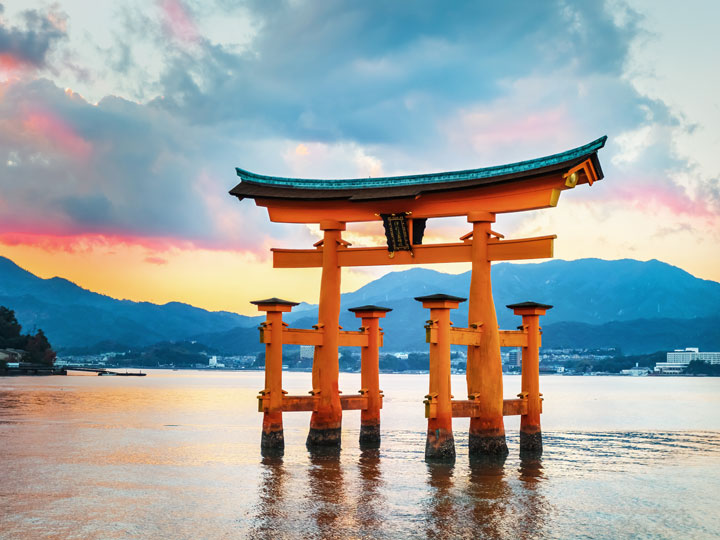 Miyajima floating torii gate at sunrise.