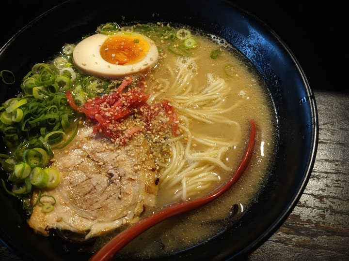 Bowl of Japanese ramen with chashu and ajitama.