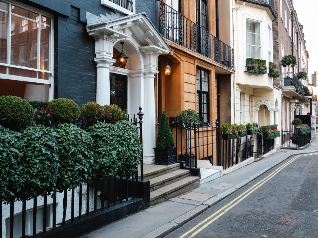 Upscale row homes and posh flats in London.