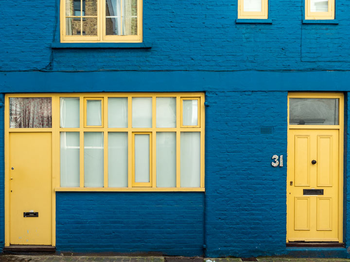 Blue house with yellow doors spotted while trying to find a flat in London.