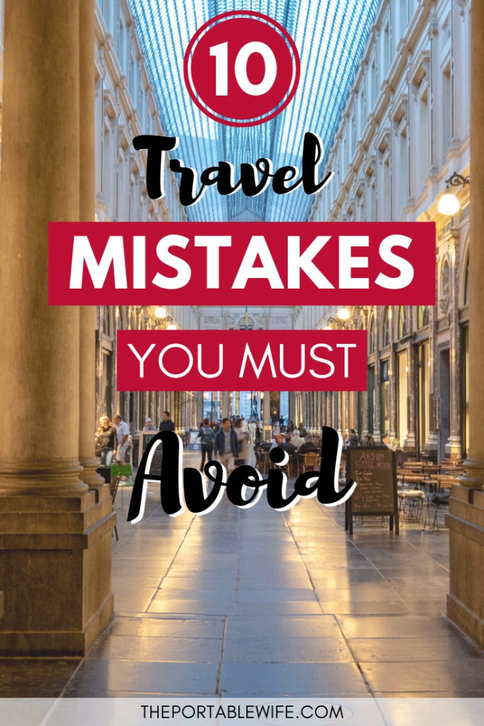 Inside hallway of shopping gallery, with text overlay - "10 International Travel Mistakes You Must Avoid".