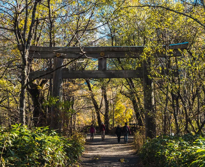 Torii gate of Hotaka Shrine seen during Kamikochi hiking.