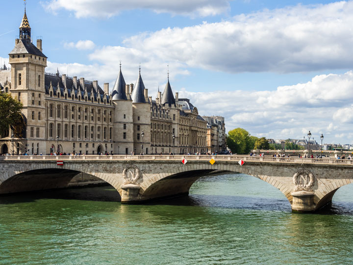 Stone bridge across Seine River in Paris.