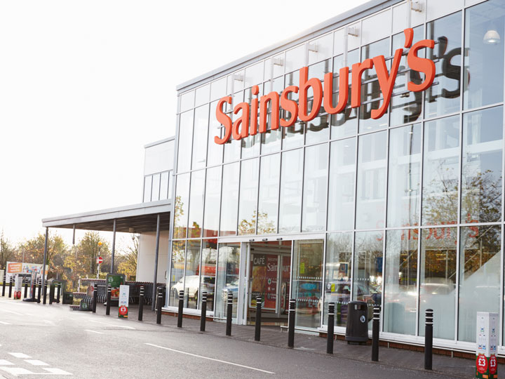 Front glass exterior of Sainsbury's chain of popular London grocery stores.