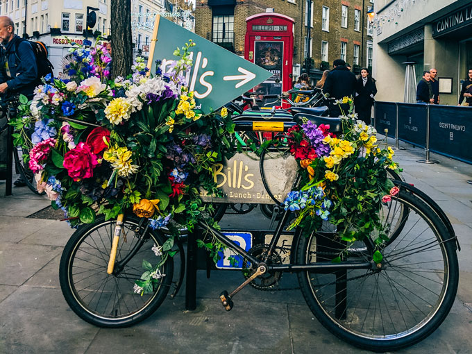 Floral bike outside Neal's Yard London.