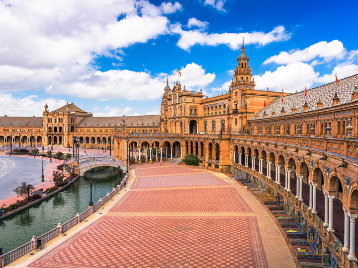 View of Plaza de Espana walkway and porticos in Seville.