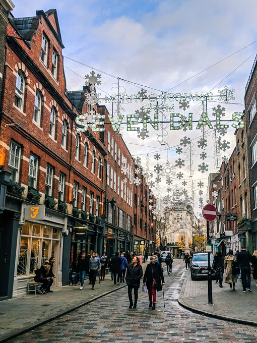 London Seven Dials at Christmas with light displays, an essential experience of living in London.