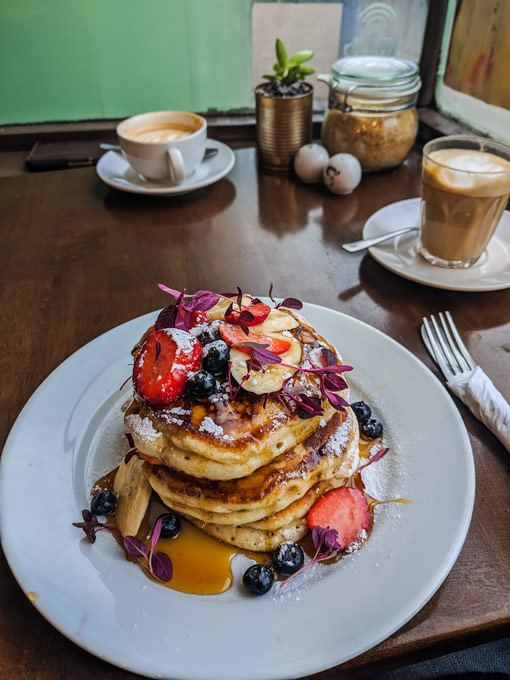 Stack of pancakes with fruit I ate during my first year living in London.