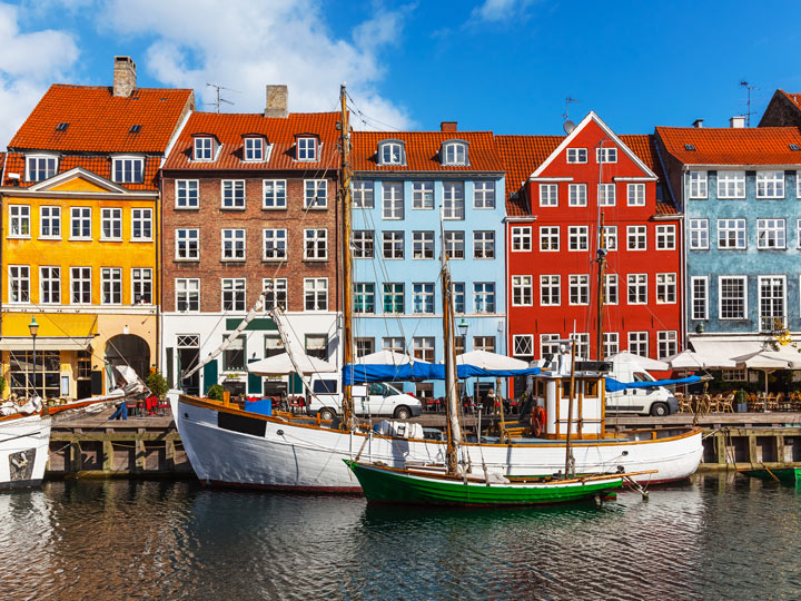 Colorful buildings behind wharf in Nyhavn district.