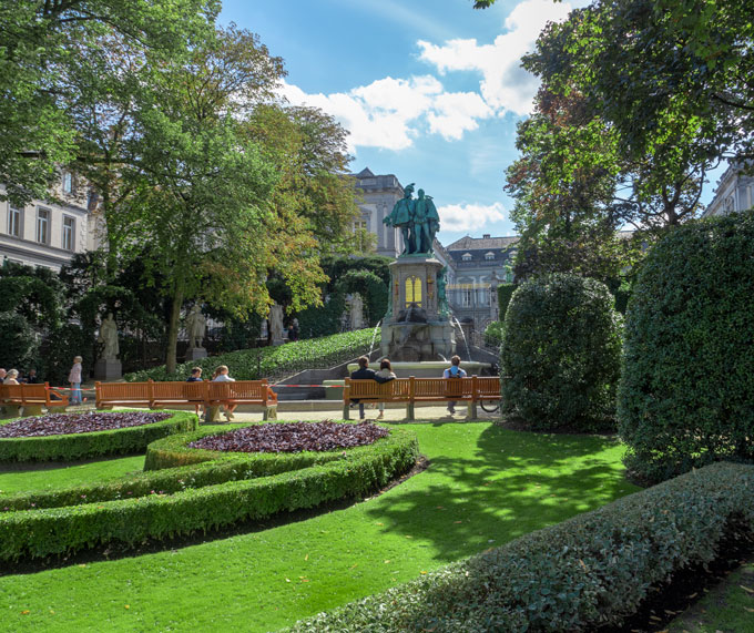 Brussels Egmont Palace gardens and large statue fountain.