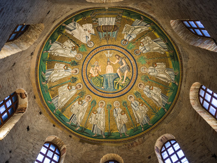 Windows and dome mosaic of Arian Baptistry in Ravenna depicting baptism of Jesus.