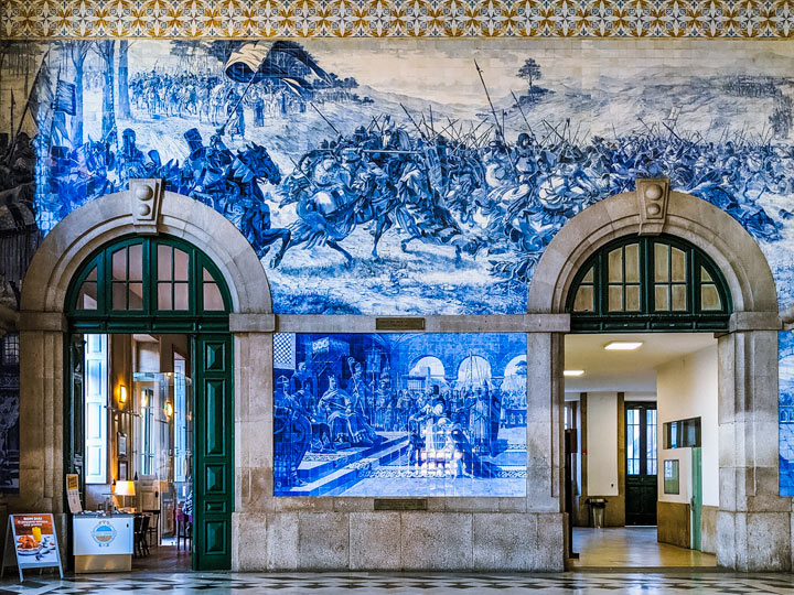 Azulejo tiles in Sao Bento station, an essential Porto itinerary stop.