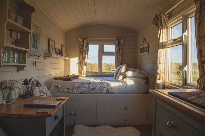 Cozy cottage staycation ideas for couples include country-inspired tiny homes.