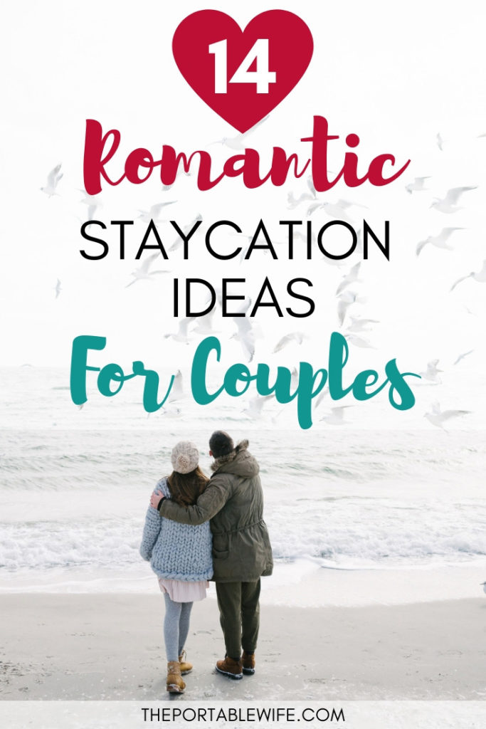 Couple standing together on beach, with text overlay - "14 Romantic Staycation Ideas For Couples".