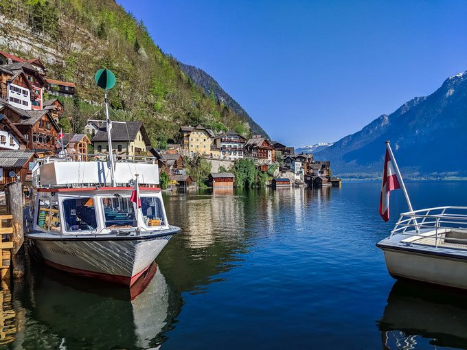 Hallstatt ferry dock with view of lake and village.
