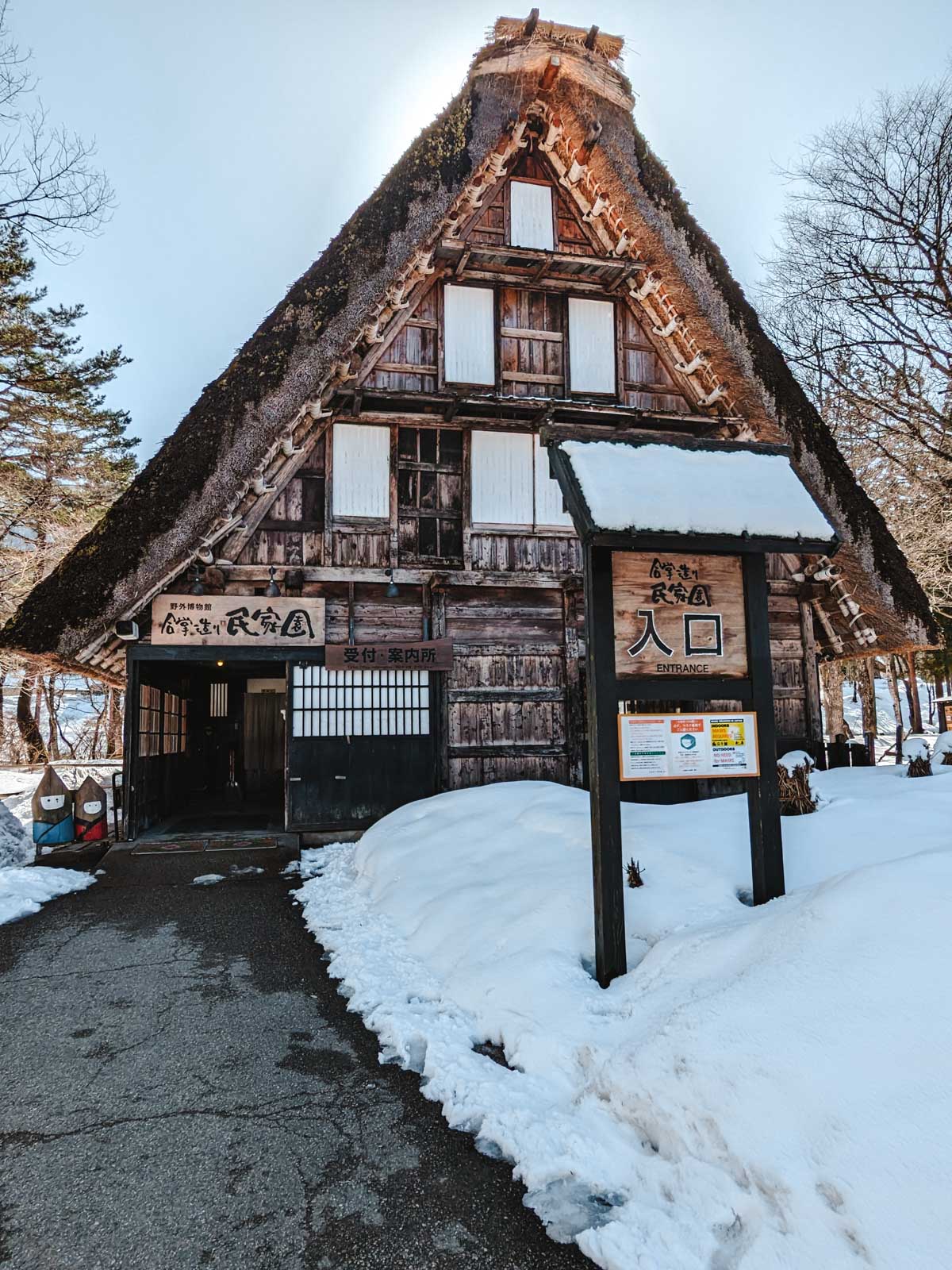 Exterior of snow-covered Gassho style entrance to Shirakawago Gassho-zukuri Minkaen.