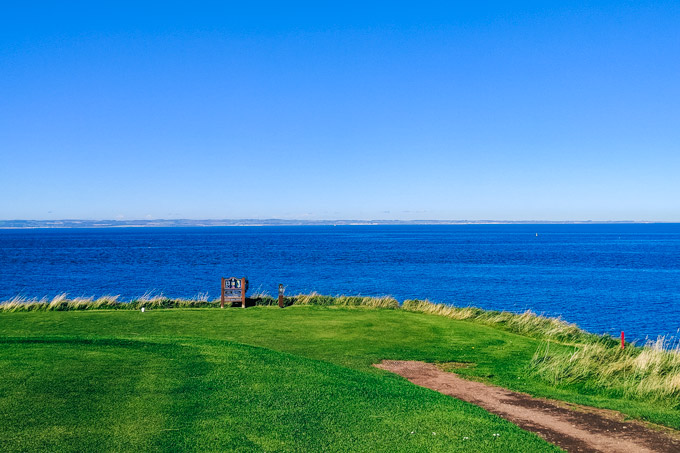 Playing at Hole 13 of Glen Golf Club, one of the best things to do in North Berwick.