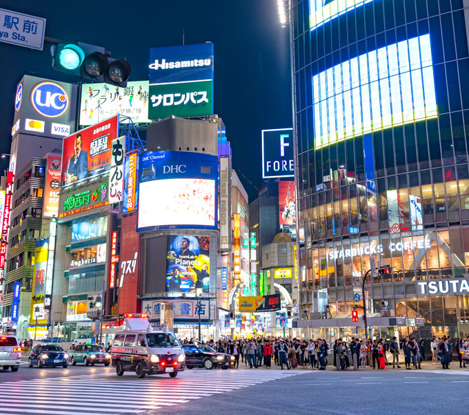 Shibuya Crossing at night, a must for any 6 day Tokyo itinerary.