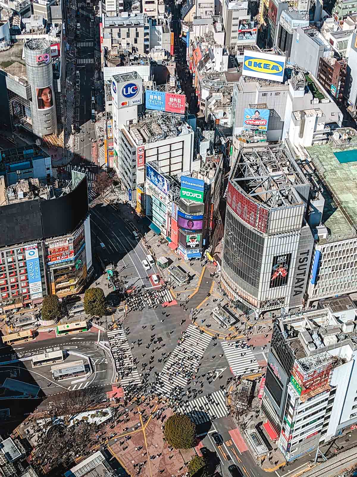 Aerial view of Shibuya Scramble area streets and buildings.