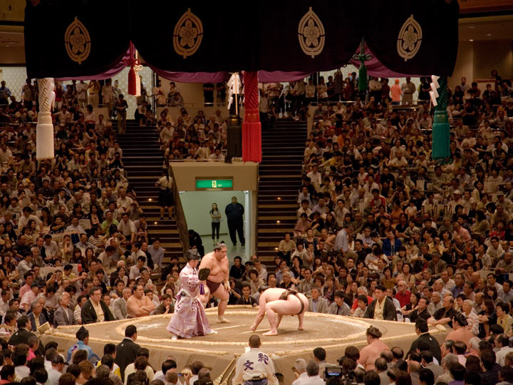 Sumo match with packed crowd in Tokyo.