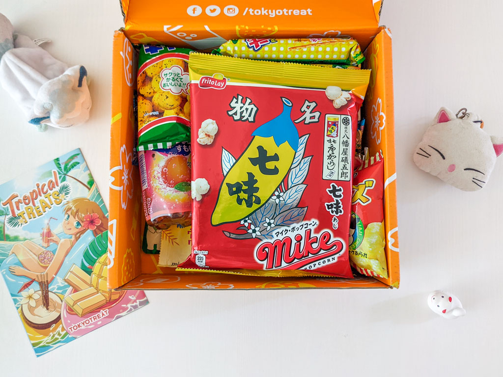 Tokyo Treat box sitting on table with popcorn bag on top.