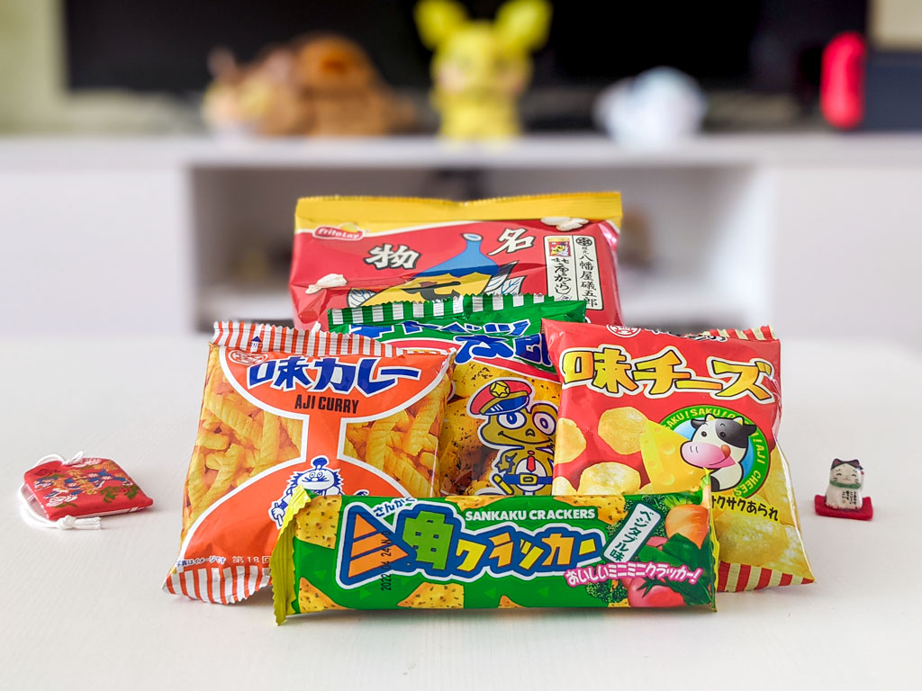 Collection of savory Japanese snacks from TokyoTreat, including curry crackers and popcorn.