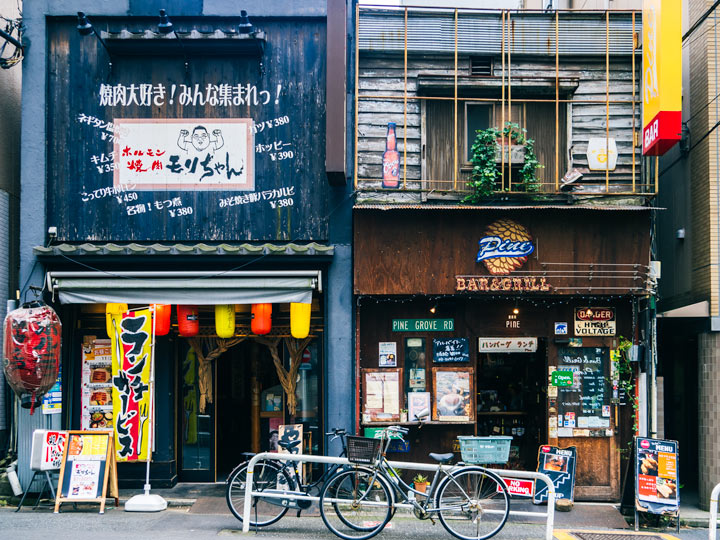 Tokyo Izakaya shops with wooden facades.