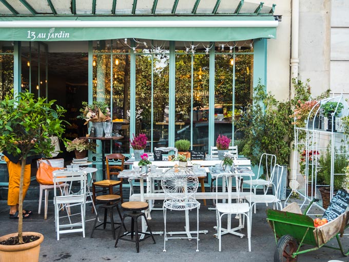 Exterior cafe seating at Treize Bakery, a typical French breakfast spot in Paris.