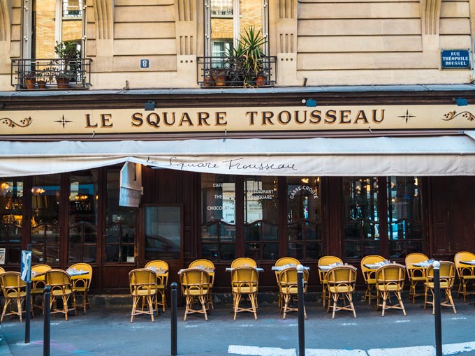 Sidewalk cafe of Le Square Trousseau for typical French breakfast fare.