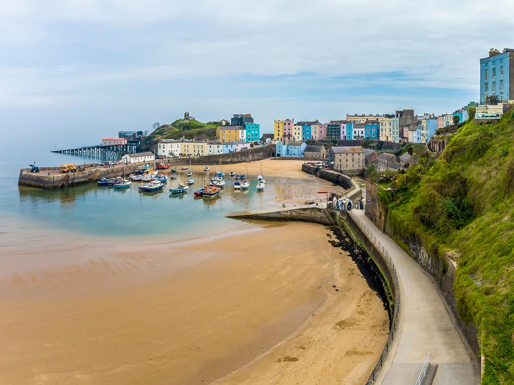 View of Tenby town center with harbour in foreground.