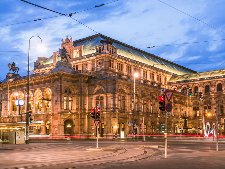 Vienna Opera House illuminated at night, a must see during this Vienna 2 day itinerary.